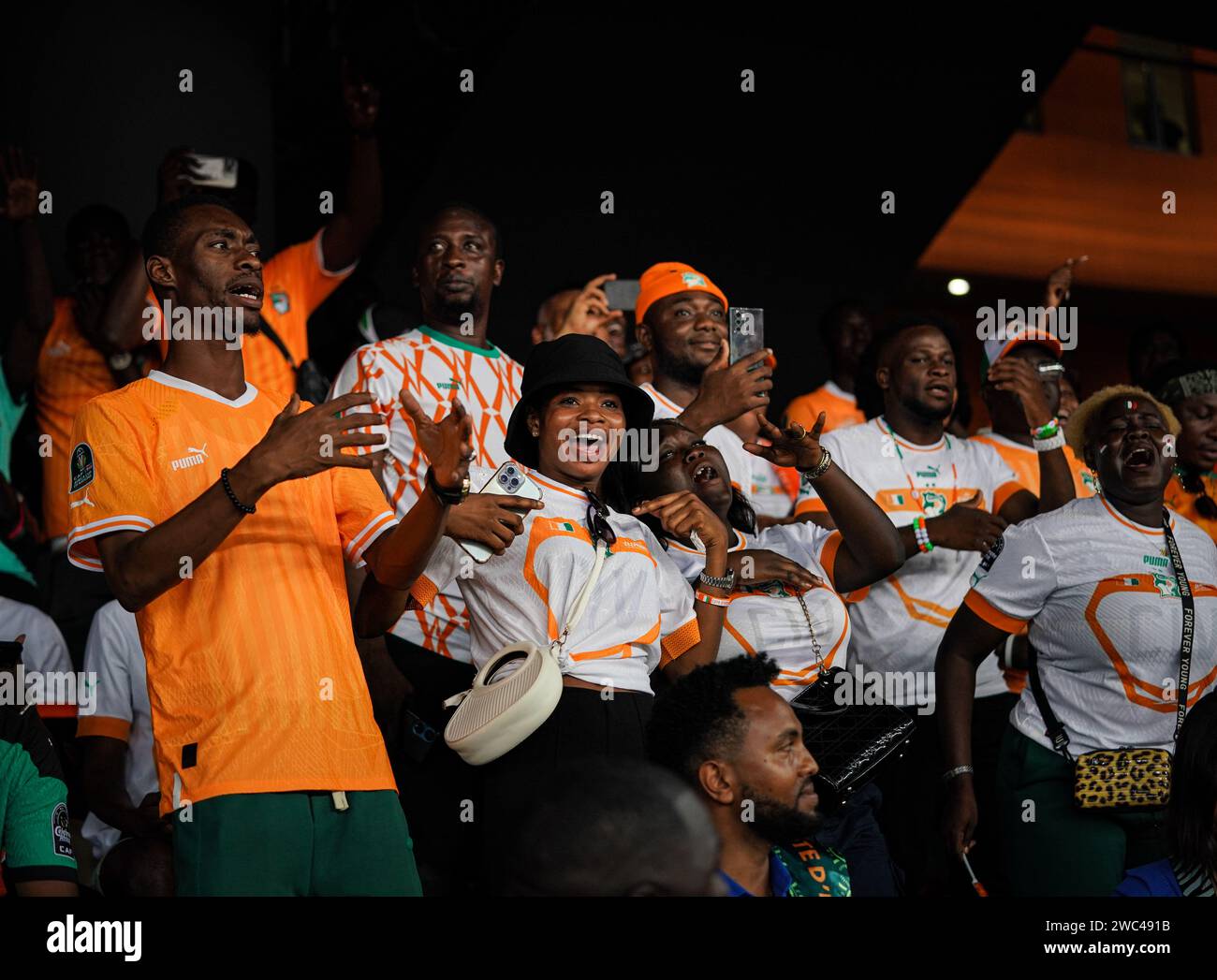 Abidjan, Cote d'Ivoire. 13th Jan, 2024. Fans are seen during the opening ceremony of the 34th edition of the Africa Cup of Nations (AFCON) in Abidjan, Cote d'Ivoire, Jan. 13, 2024. Credit: Han Xu/Xinhua/Alamy Live News Stock Photo
