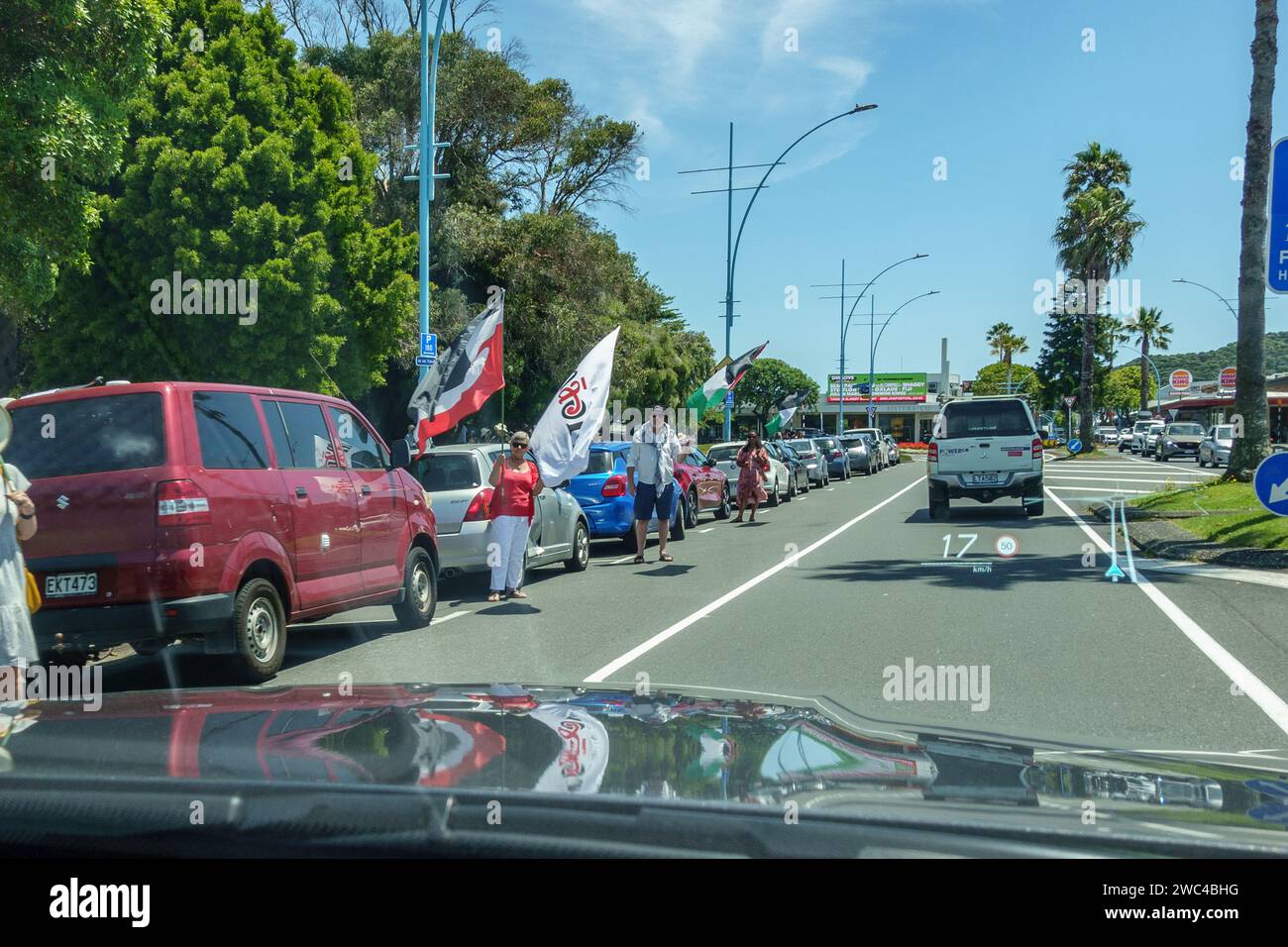 Mount Maunganui New Zealand - January 14 2024; People partaking in Pro Palestine rally with Maori sovereignty interlopers on Maunganui Road images tak Stock Photo