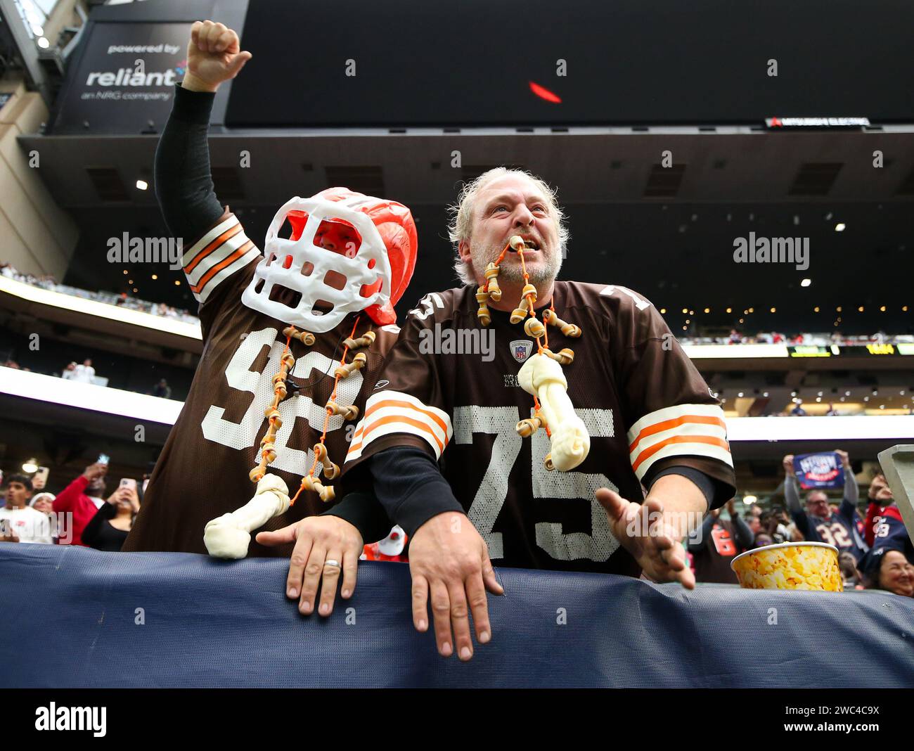 January 13, 2024: Cleveland Browns fans cheer during an NFL Wild Card playoff game between the Houston Texans and the Browns on January 13, 2024 in Houston. The Texans won, 45-14. (Credit Image: © Scott Coleman/ZUMA Press Wire) EDITORIAL USAGE ONLY! Not for Commercial USAGE! Stock Photo