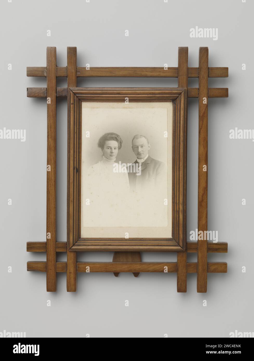 Photo Frames, 1880 - 1900 photograph. frame   olive (wood). glass. baryta paper. cardboard. metal gelatin silver print historical persons. historical persons - BB - woman. marriage, married couple, 'matrimonium' Stock Photo