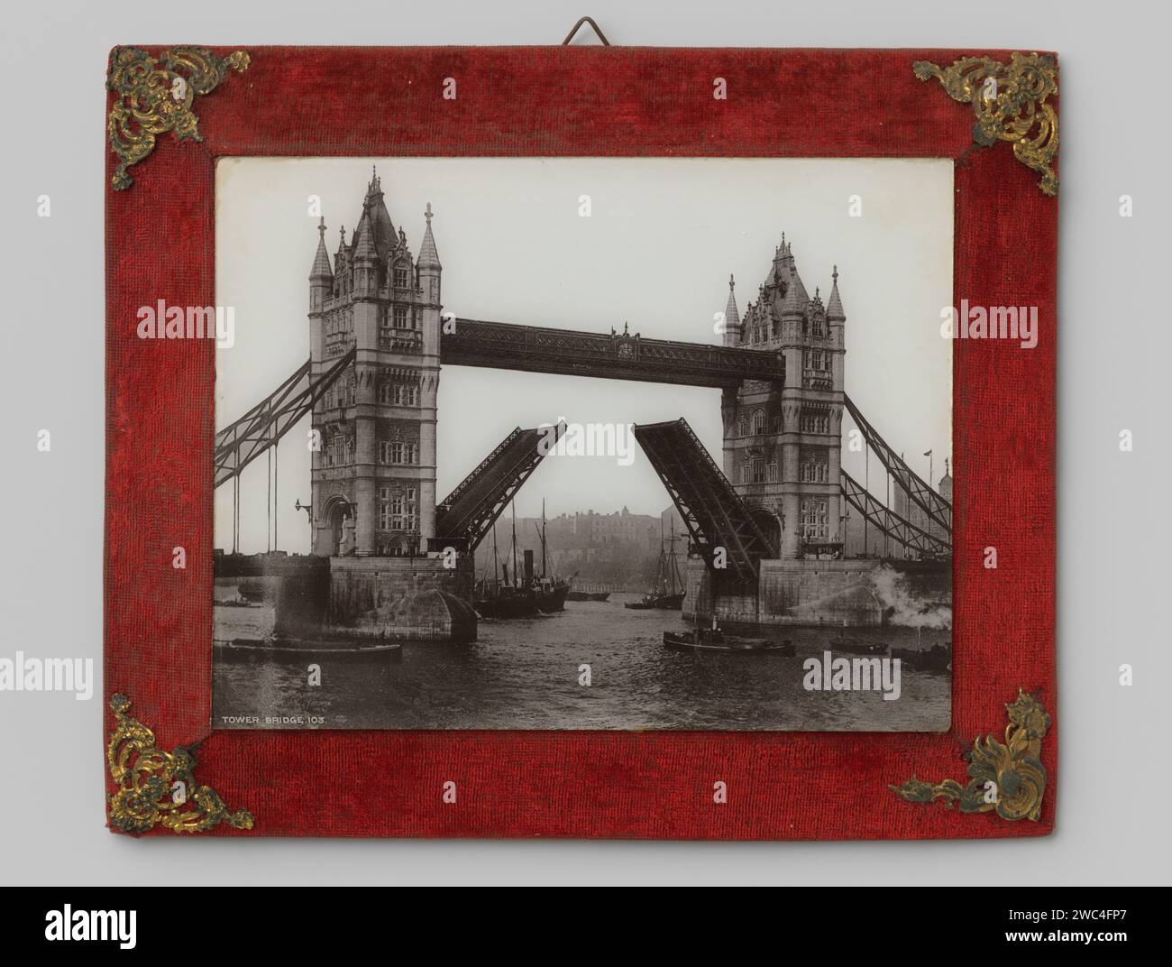 View of the Tower Bridge in London, 1894 - 1900 photomechanical print. frame  London wood (plant material). glass. paper. cardboard. metal. velvet (fabric weave) collotype bridge in city across river, canal, etc. Tower Bridge Stock Photo