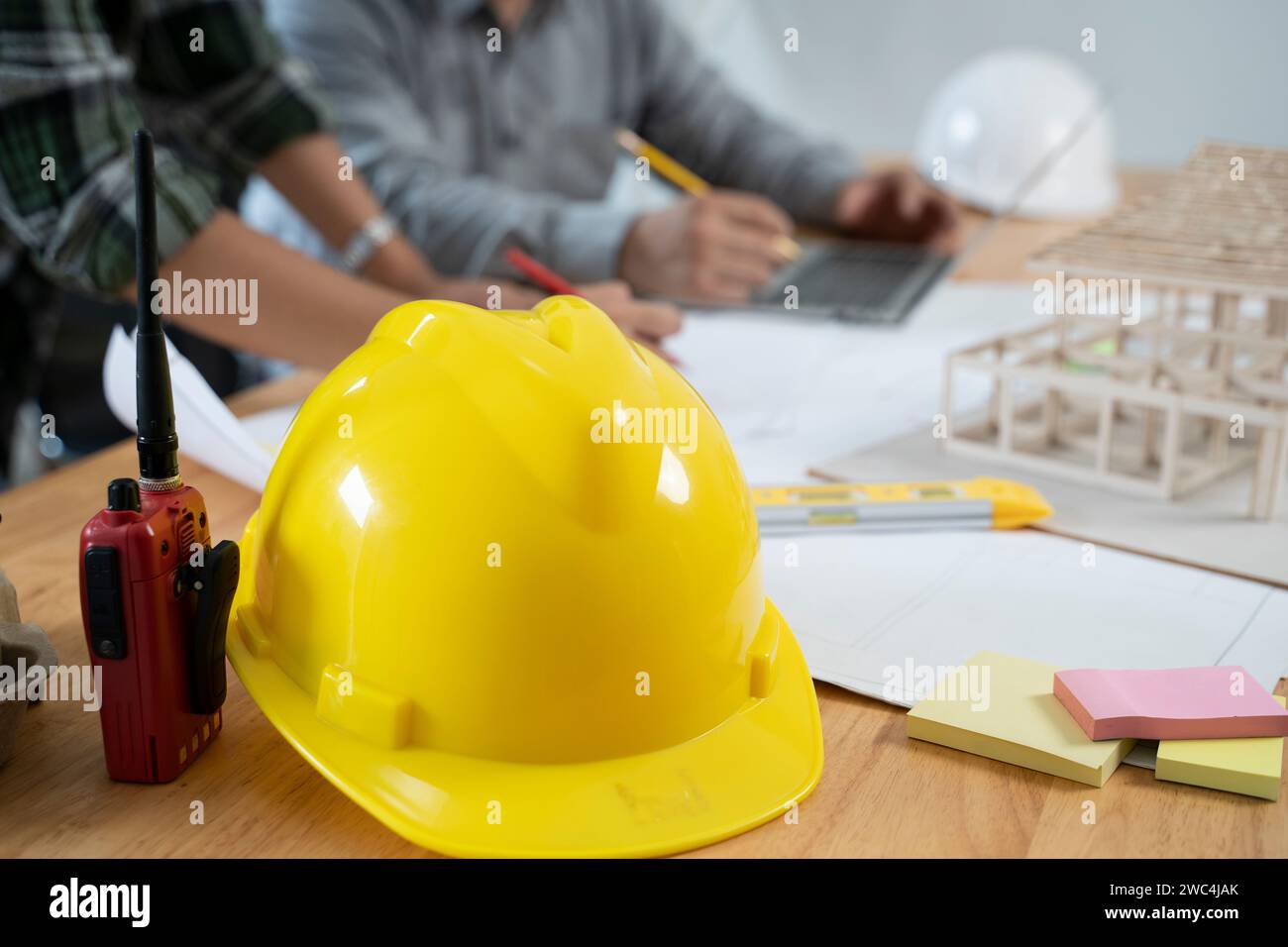 Safety helmet for radio communications in the office. Stock Photo