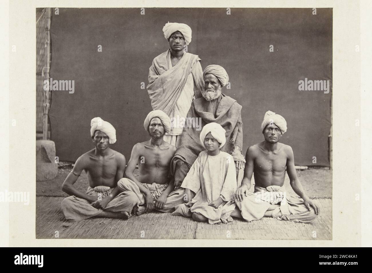 Portrait of six Indian men, Francis Frith (attributed to), 1856 - 1859 photograph  Middle East paper. cardboard albumen print adult man. head-gear: turban. anonymous historical person portrayed India Stock Photo