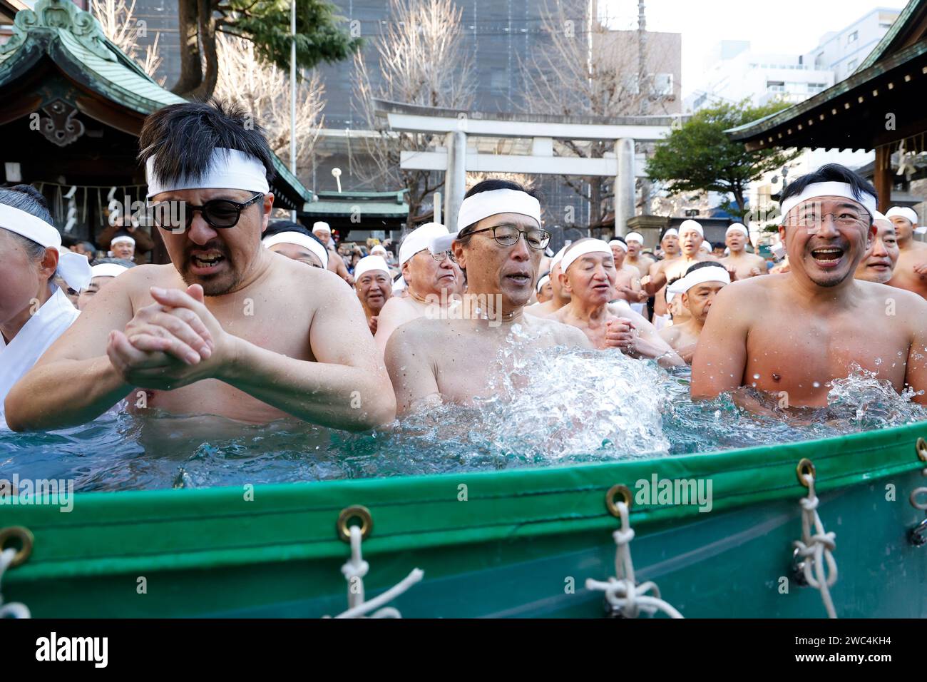 Tokyo, Japan. 14th Jan, 2024. Participants dressed only in loincloths