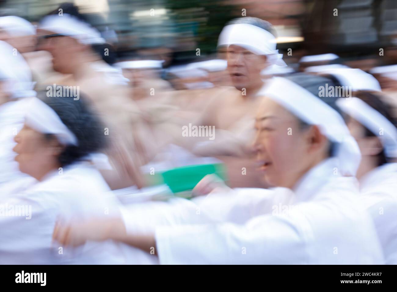 Tokyo, Japan. 14th Jan, 2024. Participants dressed only in loincloths