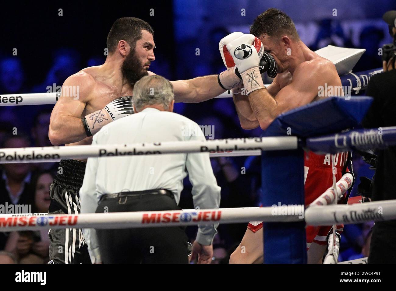 Quebec, Canada. 14th Jan, 2024. Artur Beterbiev, left, and Callum Smith