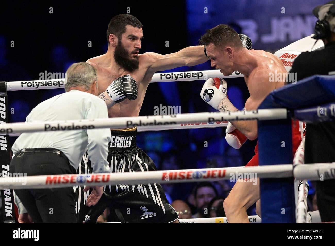 Quebec, Canada. 14th Jan, 2024. Artur Beterbiev, left, and Callum Smith