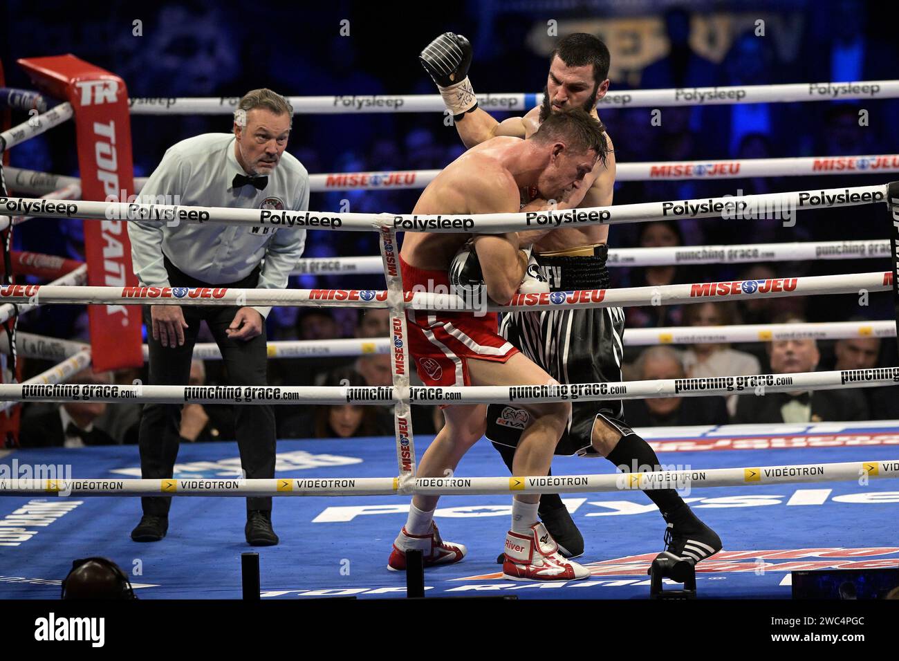 Quebec, Canada. 14th Jan, 2024. Artur Beterbiev, left, and Callum Smith