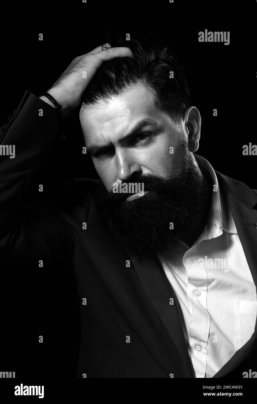 Man haircut, modern hair style. Close up portrait of male model with