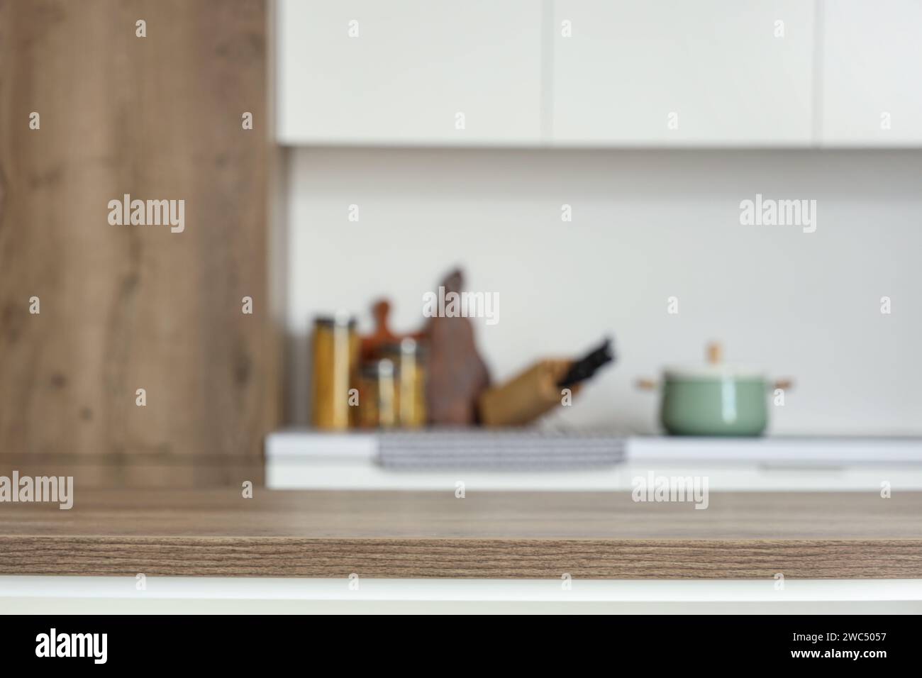 Clean wooden table in modern kitchen, closeup Stock Photo - Alamy