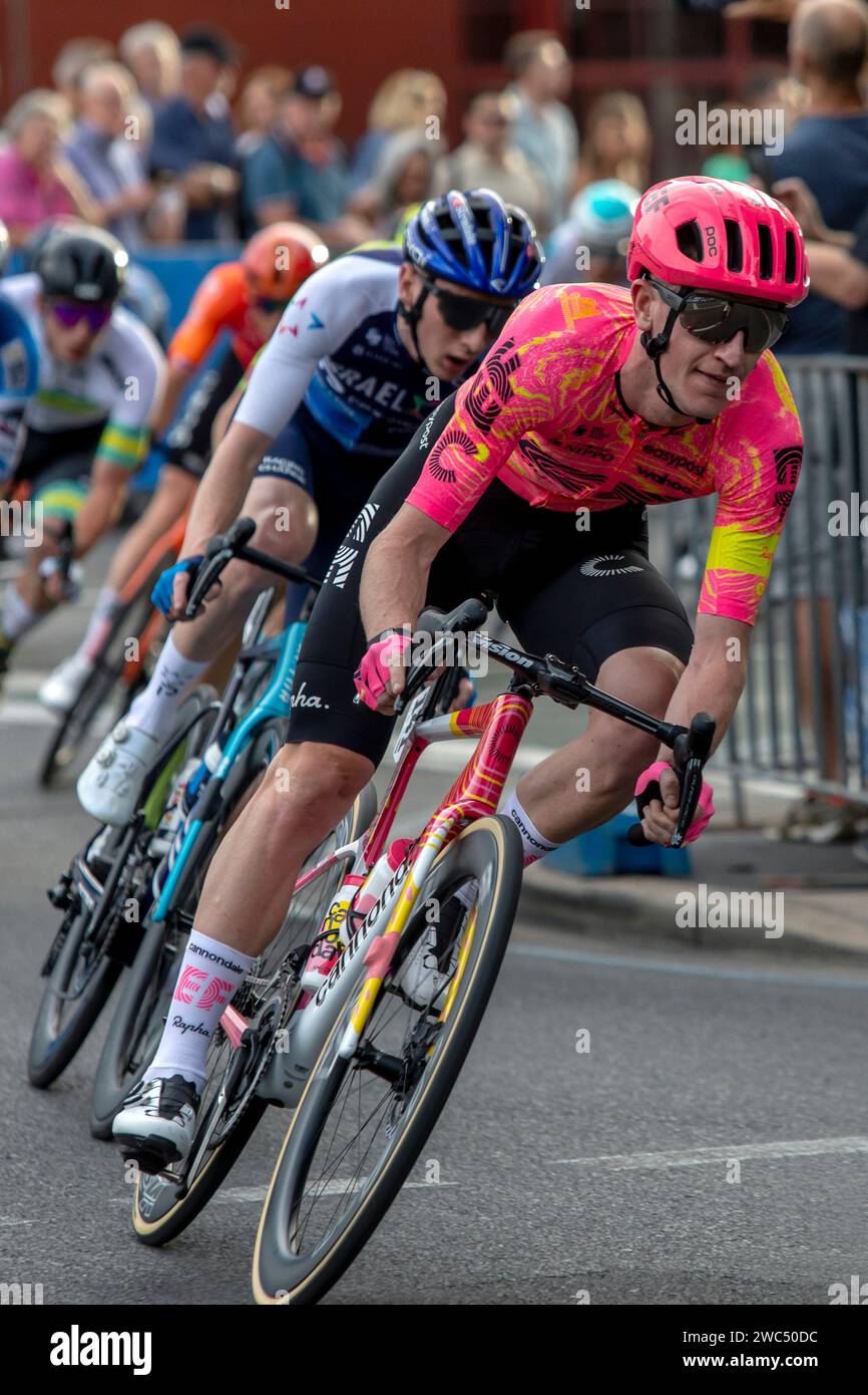 Australian rider Harrison Sweeny, EF Education Easypost - (pink shirt) races down Pulteney Street during Down Under Classic, Adelaide, South Australia Stock Photo