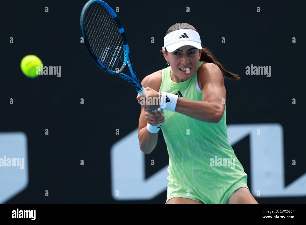 Melbourne, Australia. 14th Jan, 2024. Elina Avanesyan hits a return during the women