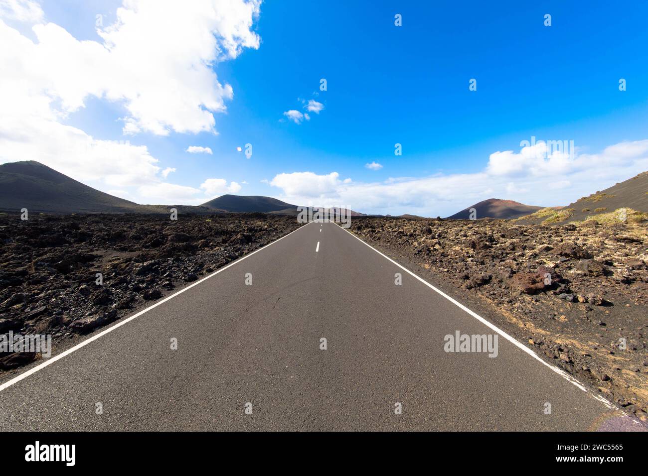 Panoramic view of empty asphalt road LZ-67 in volcanic landscape of ...