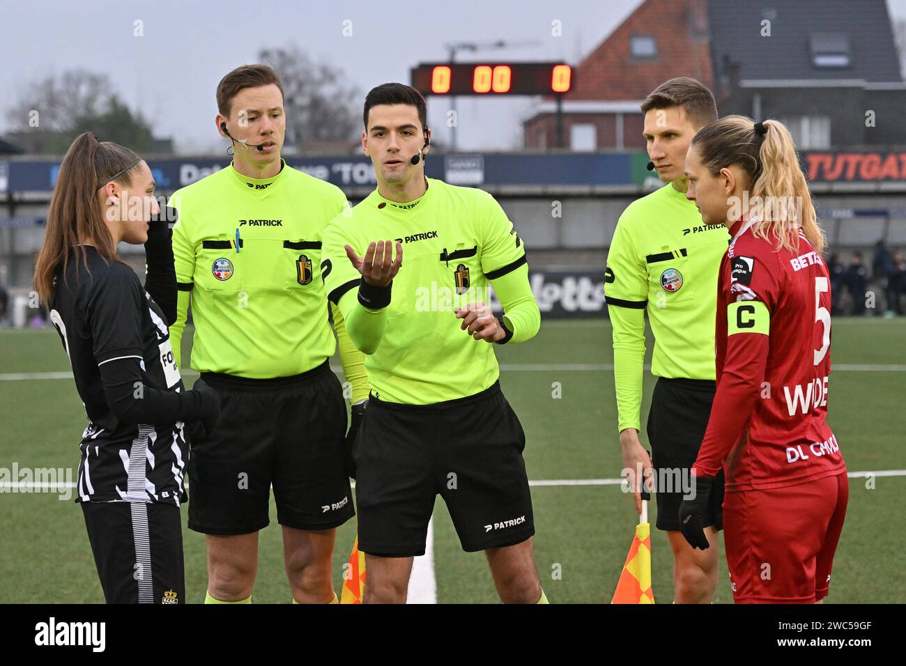 Zulte, Belgium. 13th Jan, 2024. referee Bert Verbeke with assistant referee Nicolas Van Caelenberghe and Thomas Fiers pictured together with Pauline Windels (5) of Zulte-Waregem and Perrine Balant (9) of Charleroi during a female soccer game between SV Zulte - Waregem and Sporting du pays de Charleroi on the 13 th matchday of the 2023 - 2024 season of the Belgian Lotto Womens Super League, on Sunday 13 January 2024 in Zulte, BELGIUM . Credit: sportpix/Alamy Live News Stock Photo