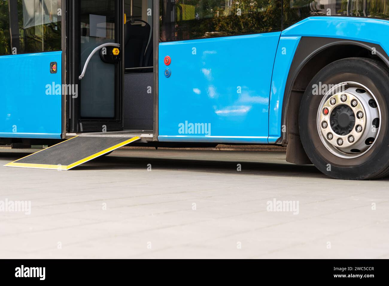 Bus ramp low floor of city bus. Accessibility of public transport. Stock Photo