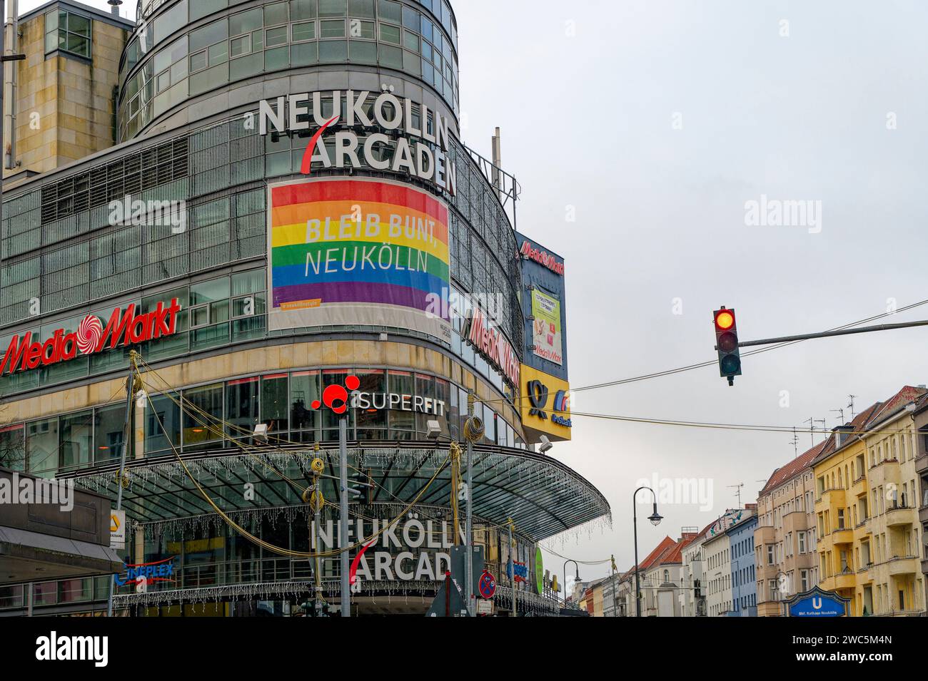 Berlin, Germany - January 1, 2024: Advertising space with different company names and logos on the facade of a shopping center in Berlin. Stock Photo