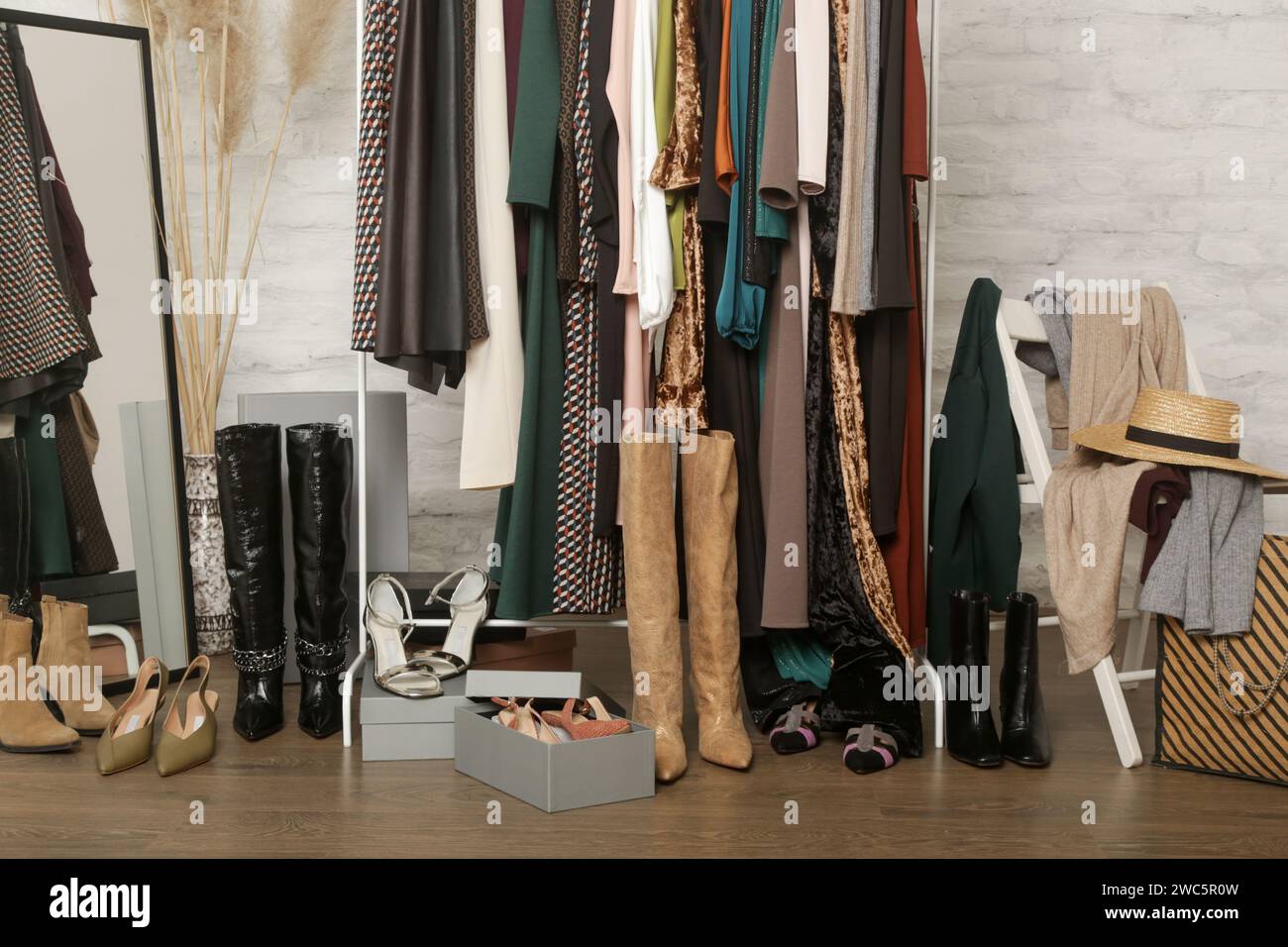 Womens clothes in wardrobe hanging hi-res stock photography and images ...