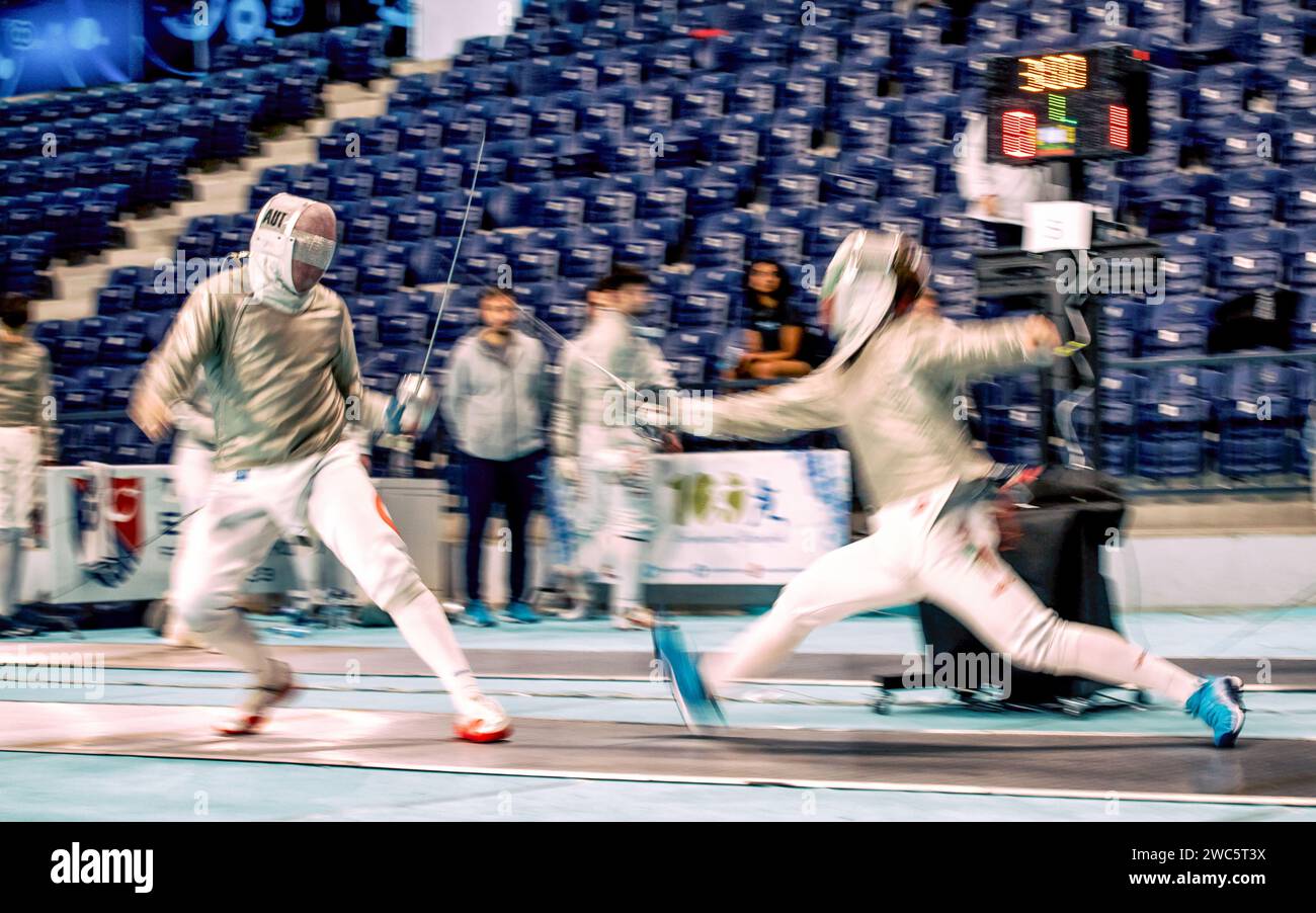 2 fencers in speedy action ,FIA Fencing Sabre World Satelite Istanbul, 21 October 2023 Stock Photo