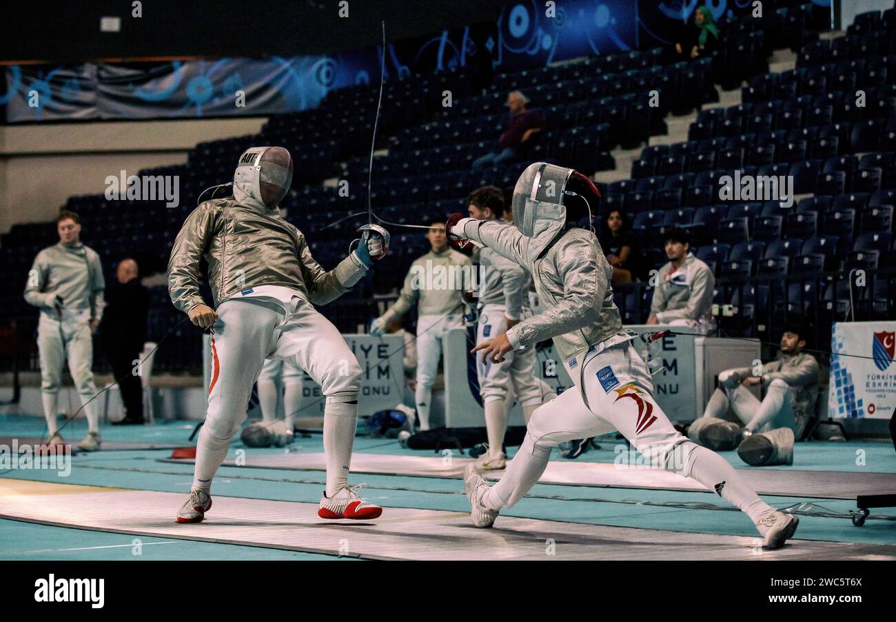 2 fencers in action ,FIA Fencing Sabre World Satelite Istanbul, 21 October 2023 Stock Photo