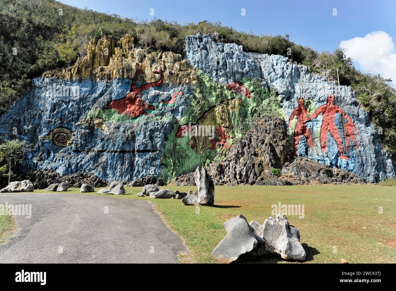 Mural de la Prehistoria, prehistoric wall, painted in 1961 by Mexican artist Leovigildo Gonzalez Morillo, size 120x180 metres, Vinales, Unesco World Stock Photo