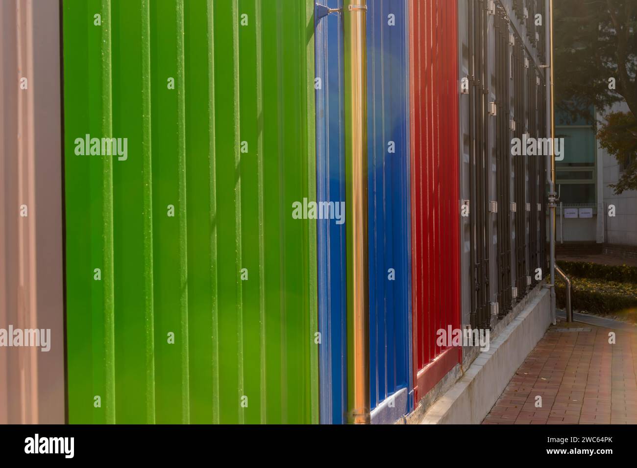 Exterior wall of building built to resemble metal shipping containers Stock Photo