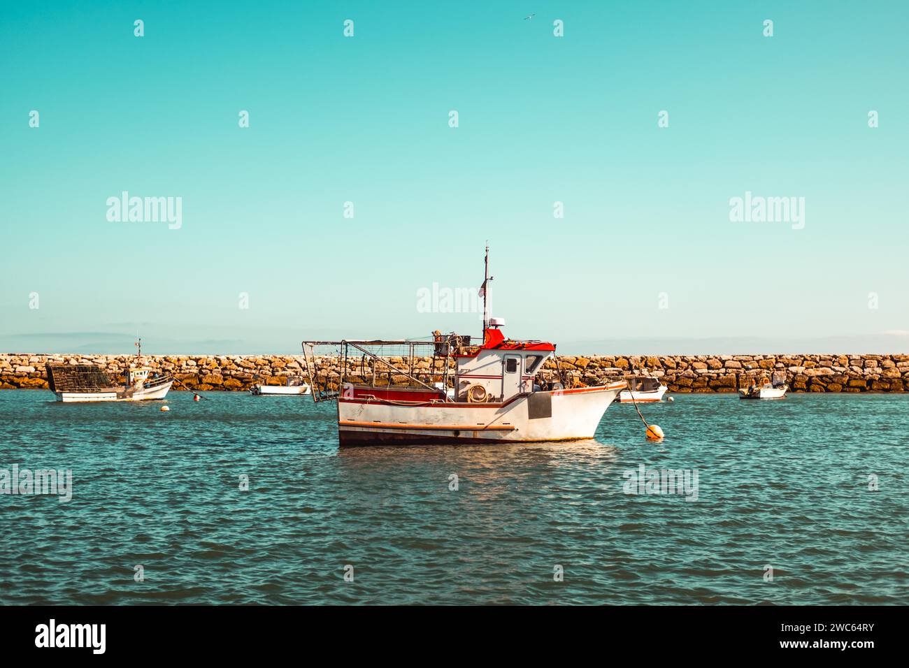 Small boat in marina of Albufeira, Algarve, south of Portugal Stock Photo