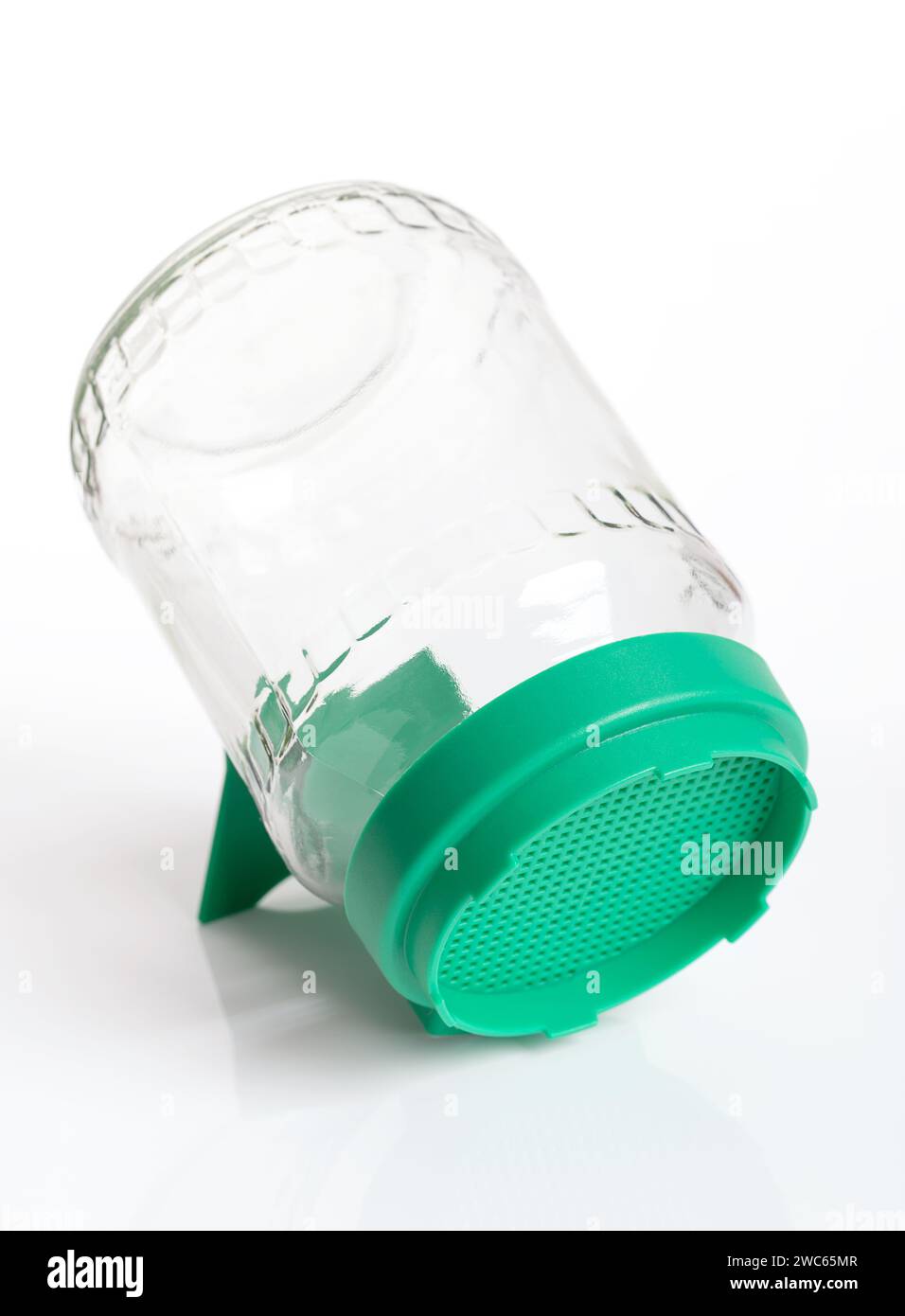 Germination glass with green sieve top. Sprouting jar for sprouting