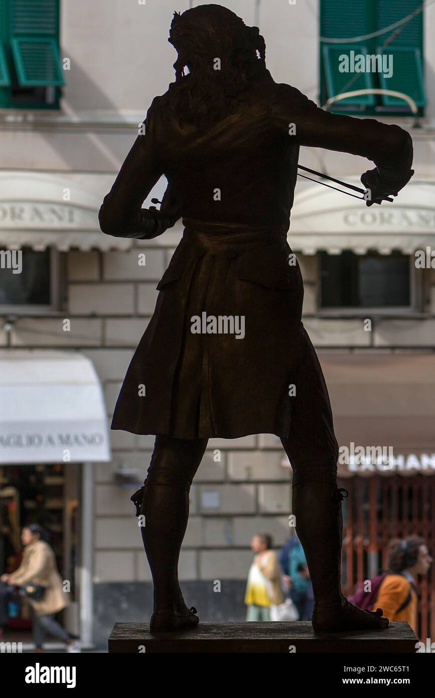 Silhouette of the bronze statue of the violinist Niccolo Paganini by the artist Niccolo Tommaseo, entrance hall of the Teatro Carlo Felice, Passo Stock Photo