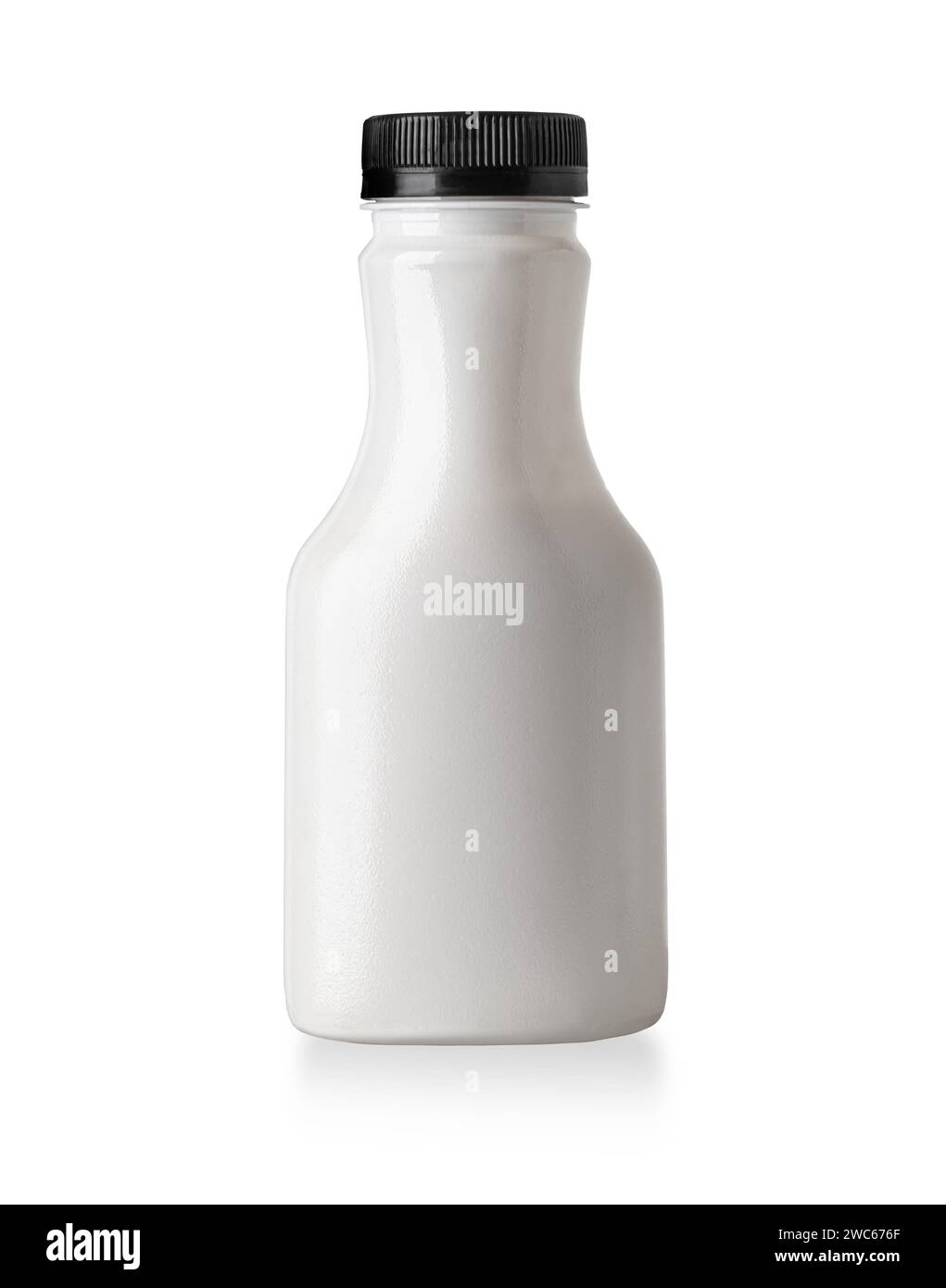 a small plastic yogurt bottle on a white background Stock Photo