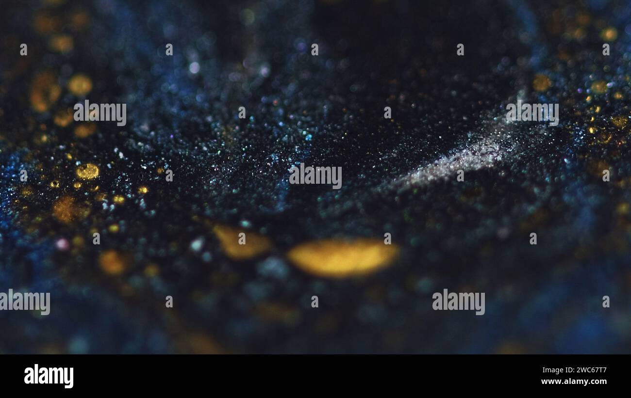 Glitter fluid texture sparkling paint flow blue Stock Photo Alamy