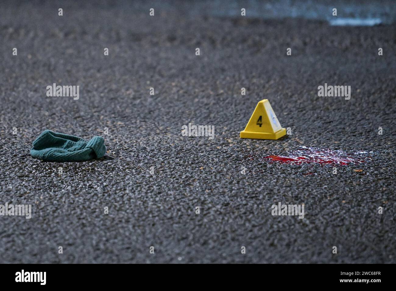 Birmingham, 13th January 2024 - West Midlands Police are investigating after a man in his 40's was hit and left with life-threatening injuries in a horrifying hit and run on a notorious ring road through Birmingham city centre. The incident happened on Belgrave Middleway close to the city's Central Mosque on Saturday 13th at around 6.30pm. The man was hit at a pedestrian crossing on a 40mph average speed camera arterial road. A jumper and hat were spotted on the road close to a pool of blood amongst evidence markers, as was a paper cup. Two men aged 39 and 27 have been arrested on suspicion of Stock Photo