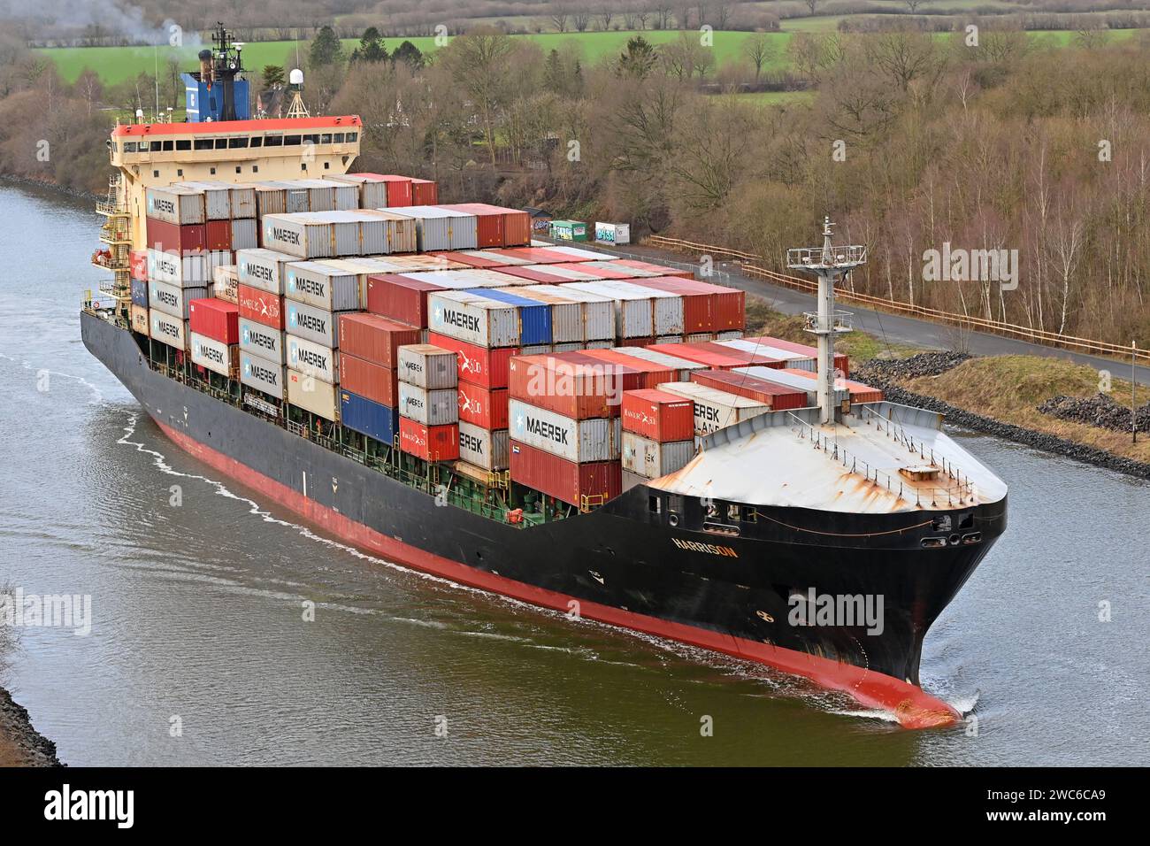 Containership HARRISON passing the Kiel Canal Stock Photo