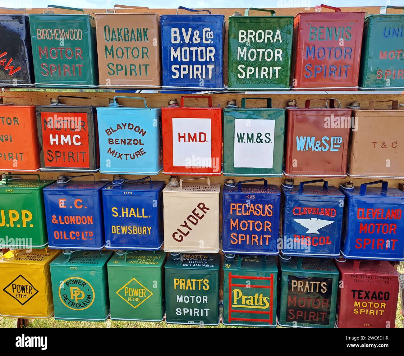Display of vintage oil cans at a country show Stock Photo Alamy