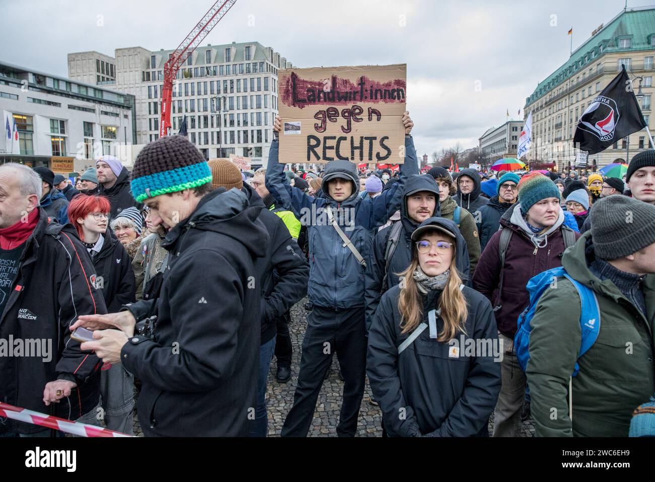 January 14, 2024, Berlin, Germany: In an unparalleled show of solidarity, the streets of Berlin on January 14, 2024, echoed with the voices of 25,000 protesters as they converged at Pariser Platz in the shadow of the iconic Brandenburg Gate. The demonstration, orchestrated by Fridays for Future Berlin and backed by an extensive coalition of civil society groups, NGOs, and activists, marked a decisive stand against right-wing extremism and a relentless defense of democratic values. Under the theme ''We Stand Together'' was a direct response to the chilling findings of an investigative report by Stock Photo