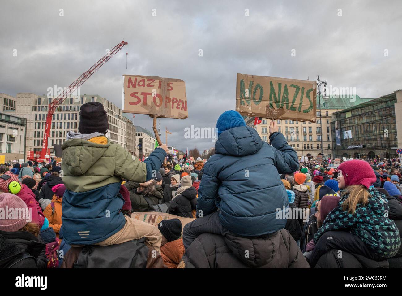 January 14, 2024, Berlin, Germany: In an unparalleled show of solidarity, the streets of Berlin on January 14, 2024, echoed with the voices of 25,000 protesters as they converged at Pariser Platz in the shadow of the iconic Brandenburg Gate. The demonstration, orchestrated by Fridays for Future Berlin and backed by an extensive coalition of civil society groups, NGOs, and activists, marked a decisive stand against right-wing extremism and a relentless defense of democratic values. Under the theme ''We Stand Together'' was a direct response to the chilling findings of an investigative report by Stock Photo