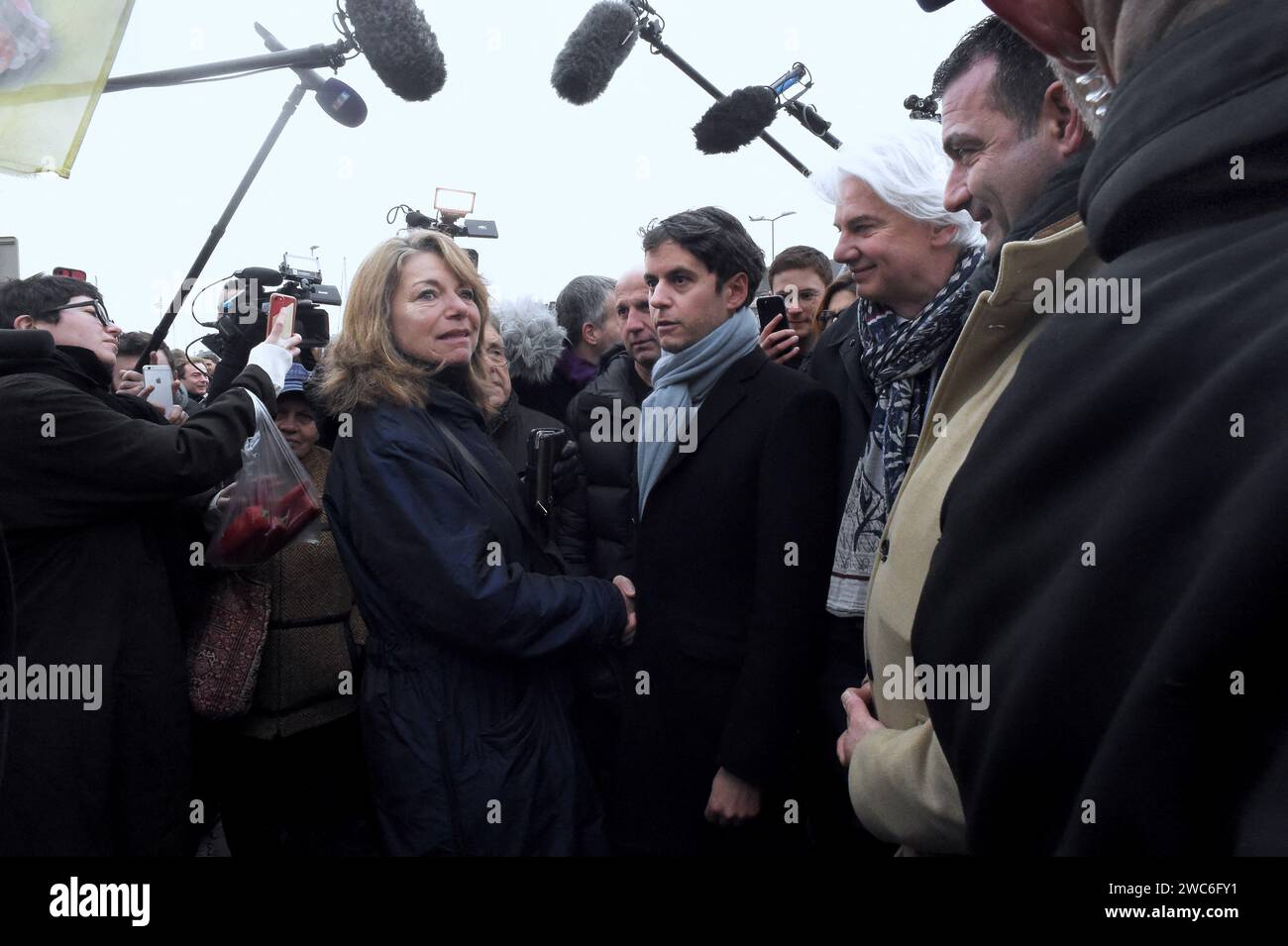 French Prime Minister Gabriel Attal and French Calvados Member of Parliament Fabrice Le Vigoureux meet with members of the public at the Caen market during a visit to talk about purchasing power, in Caen, northwestern France, on January 14, 2024. Photo by Franck Castel/ABACAPRESS.COM Stock Photo