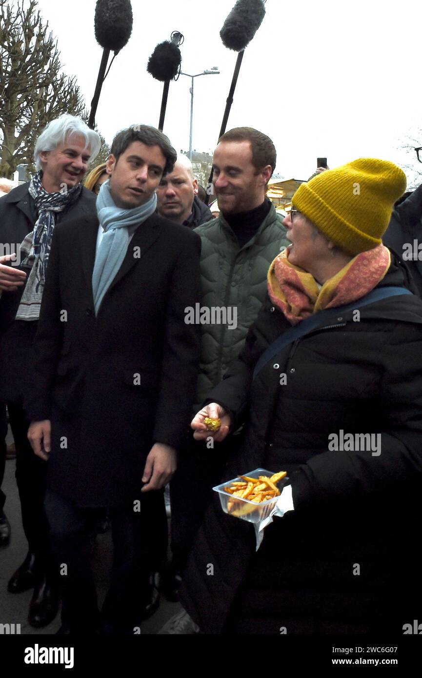 French Prime Minister Gabriel Attal and French Calvados Member of Parliament Fabrice Le Vigoureux meet with members of the public at the Caen market during a visit to talk about purchasing power, in Caen, northwestern France, on January 14, 2024. Photo by Franck Castel/ABACAPRESS.COM Stock Photo