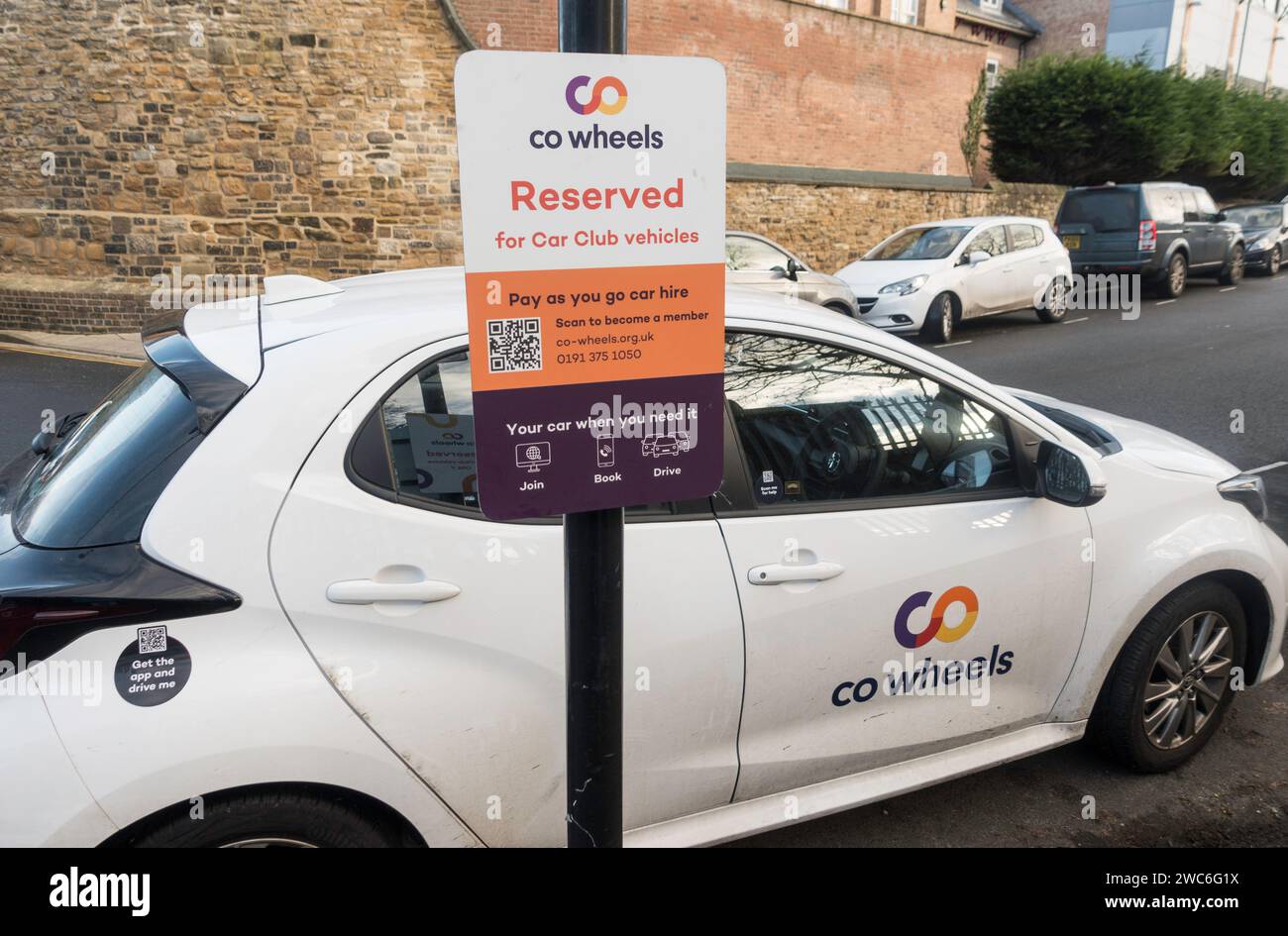 co wheels car club hire car in a reserved parking place, England, UK Stock Photo