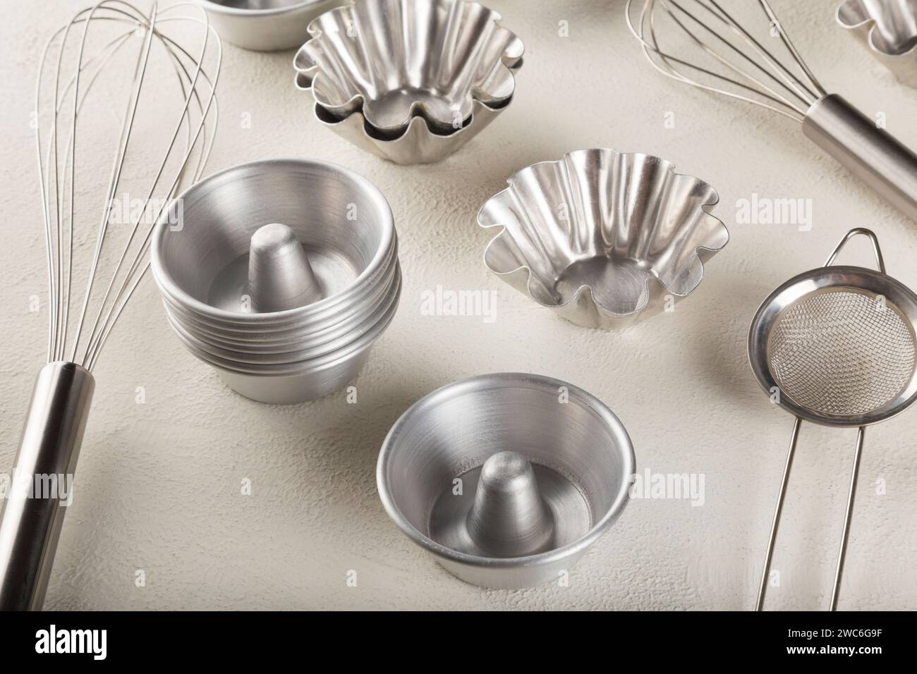 kitchen utensils on light background, seen from above. Stock Photo