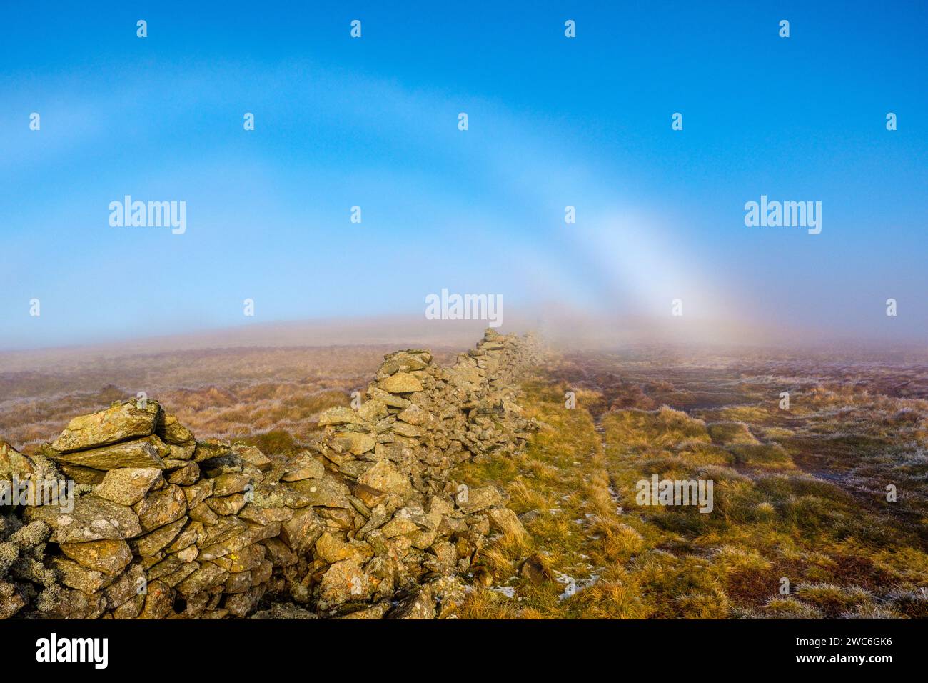 A fogbow on a hill in the Lake District National Park Stock Photo