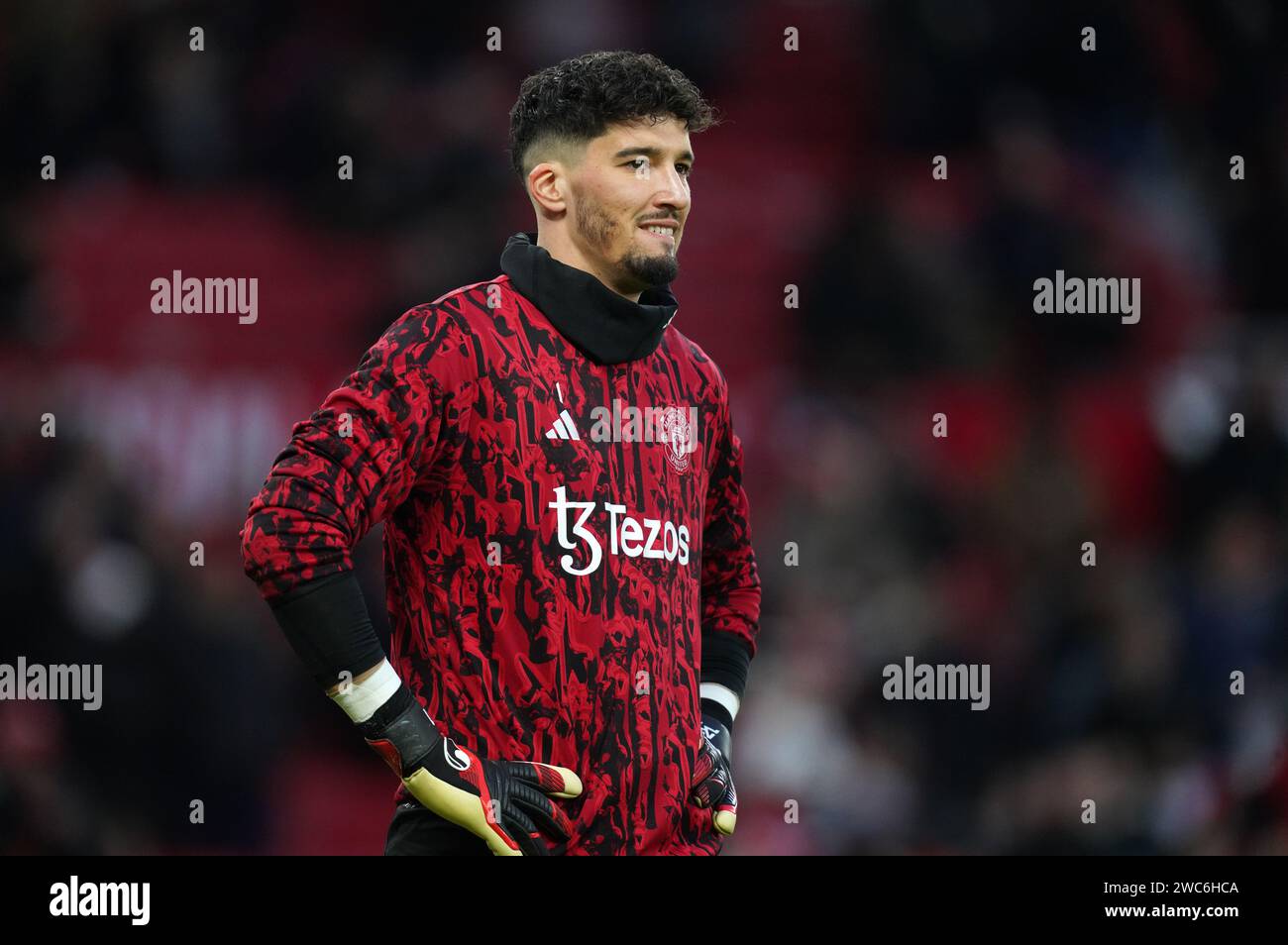Manchester United goalkeeper Altay Bayindir warming up before the