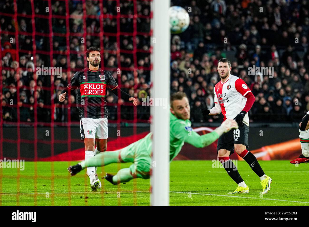 Rotterdam, The Netherlands. 14th Jan, 2024. Rotterdam - Santiago Gimenez of Feyenoord scores the 2-0 during the Eredivisie match between Feyenoord v NEC at Stadion Feijenoord De Kuip on 14 January 2024 in Rotterdam, The Netherlands. Credit: box to box pictures/Alamy Live News Stock Photo
