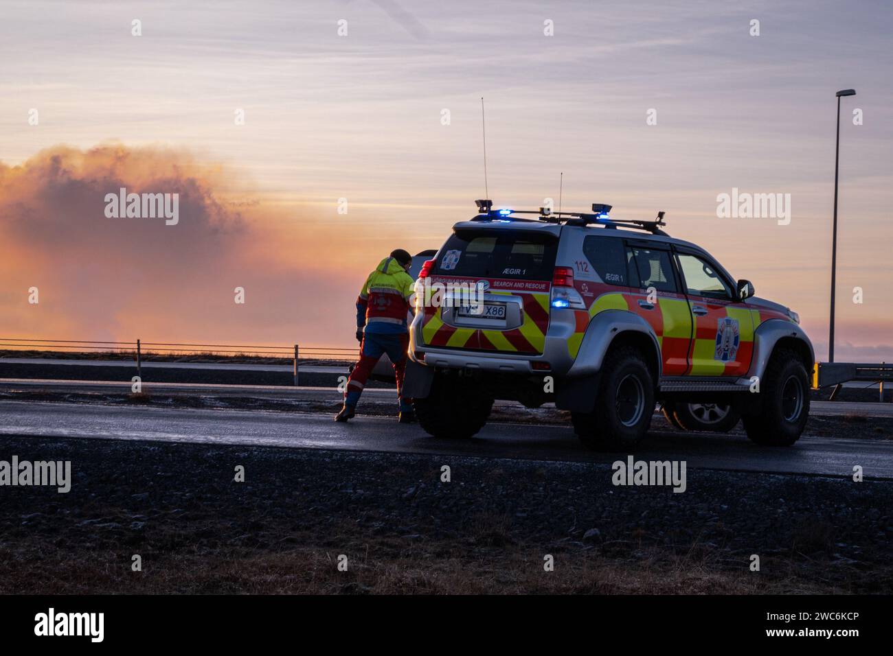 Grindavik, Iceland. 14th Jan, 2024. Emergency teams are in charge of controlling the access areas near the volcanic zone. The new volcanic eruption started early in the morning of 14 January 2024. The new fissures opened up about 450 metres from the town of Grindavik and lava is heading in the direction of the town. Emergency crews were able to evacuate the entire population in time. Credit: SOPA Images Limited/Alamy Live News Stock Photo