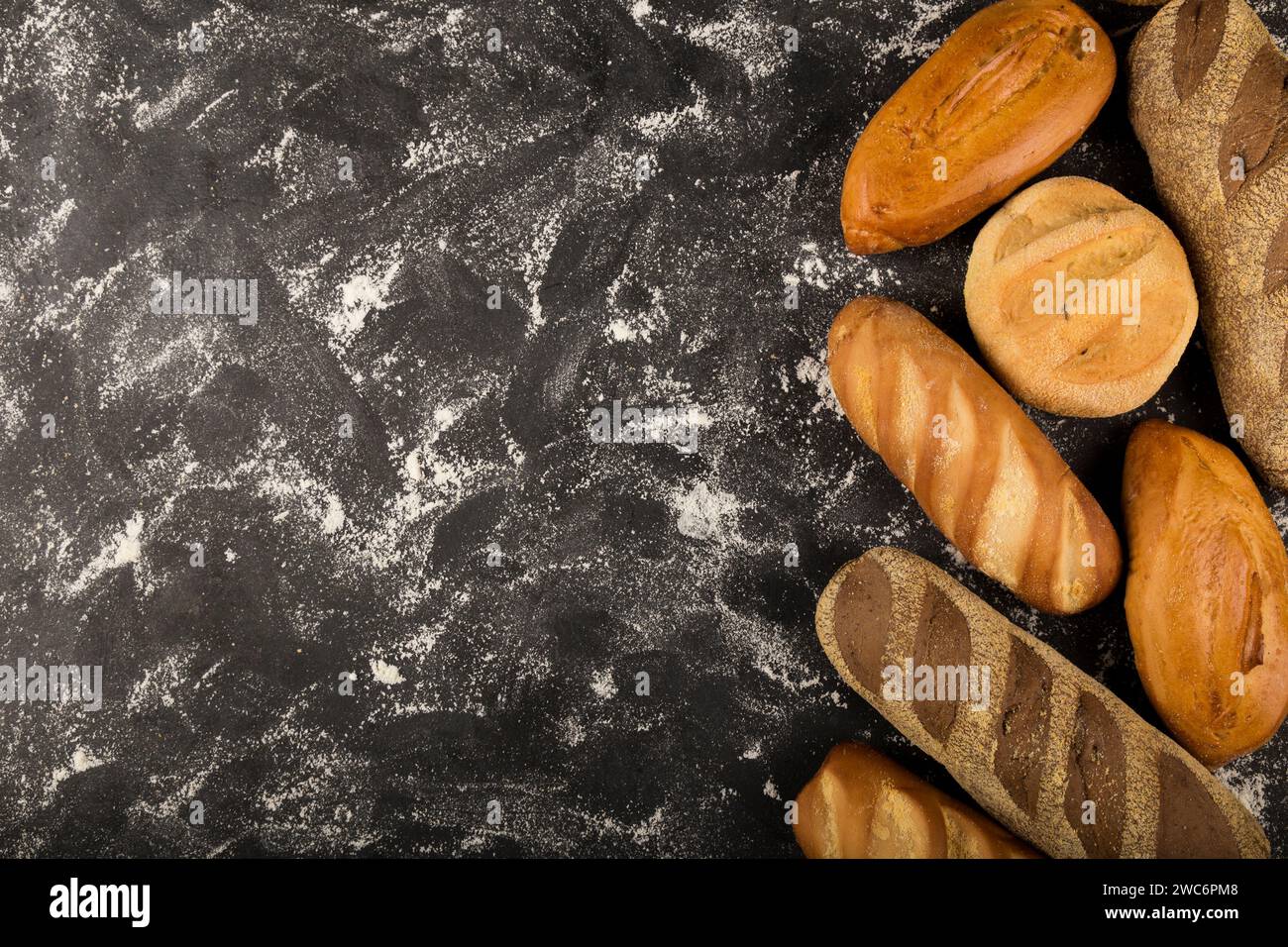 Bakery. Different types of fresh bread on the table. Stock Photo