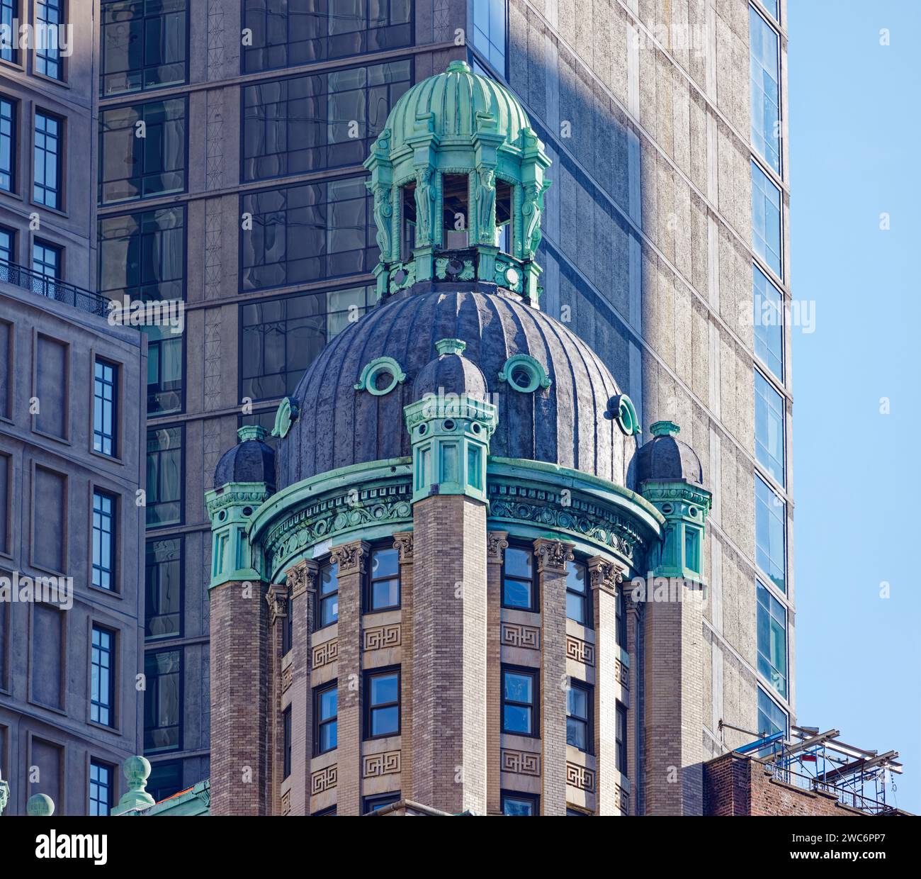 A pair of copper-cupola-topped towers crown 15 Park Row, a NYC Financial District landmark now converted from commercial to residential use. Stock Photo