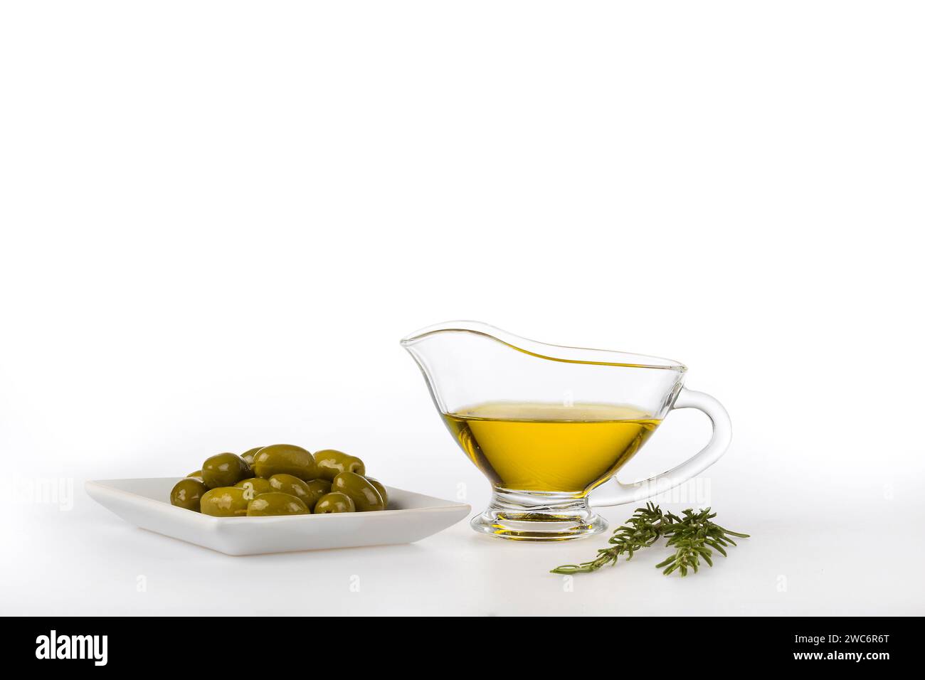 Virgin olive oil bottle with olives isolated on white background Stock ...