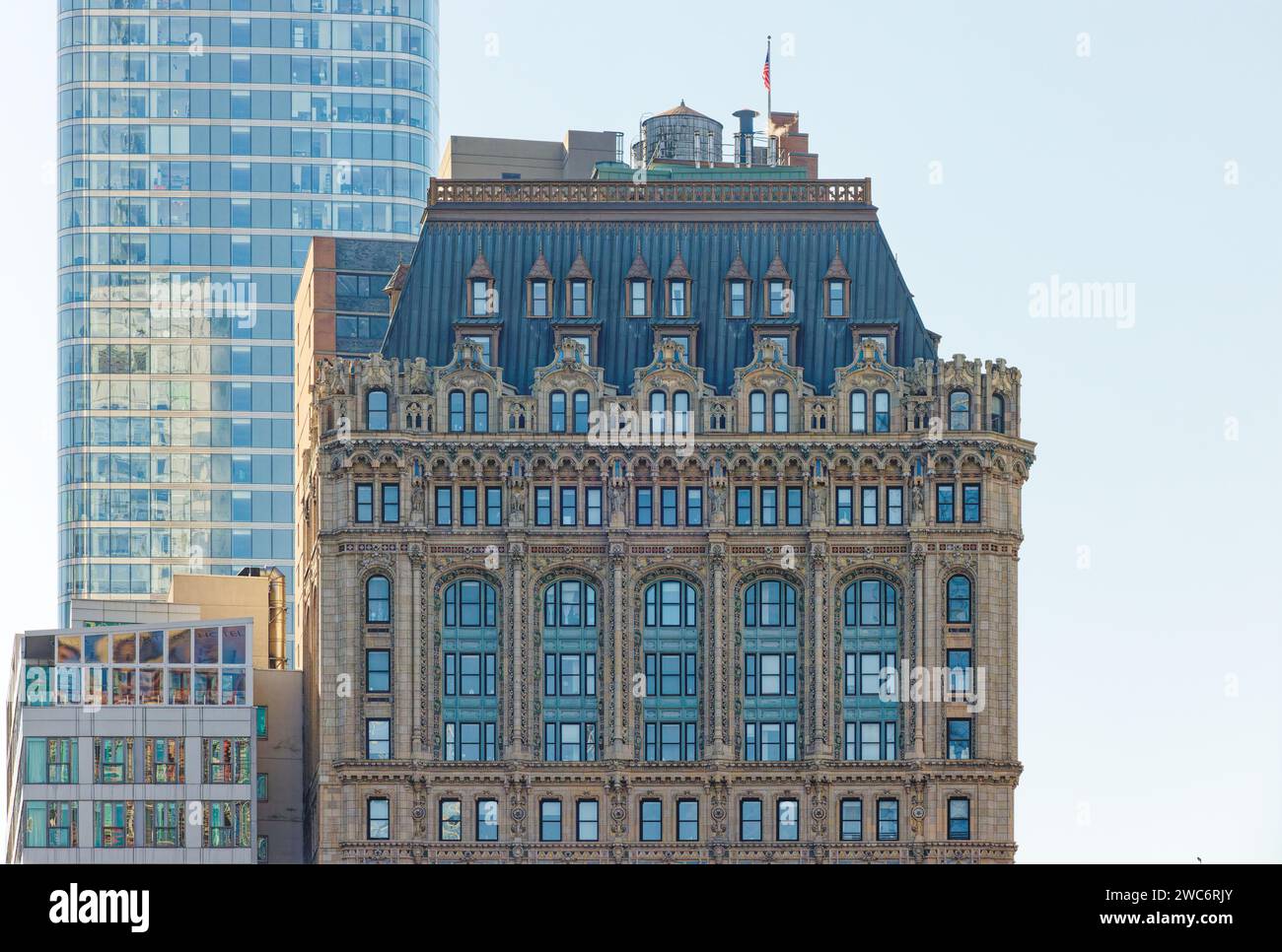 Cass Gilbert’s 90 West Street, richly embellished with polychrome terra cotta, restored after heavy 9/11 damage, converted to residential use. Stock Photo