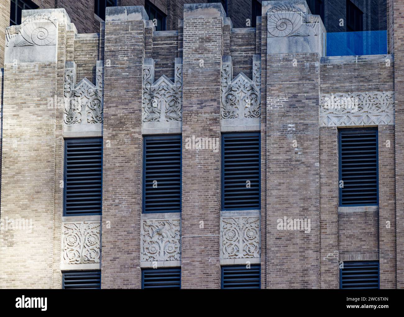 Barclay-Vesey Building’s polychrome brick façade is decorated in carved limestone on lower floors, cast stone on upper floors. Stock Photo