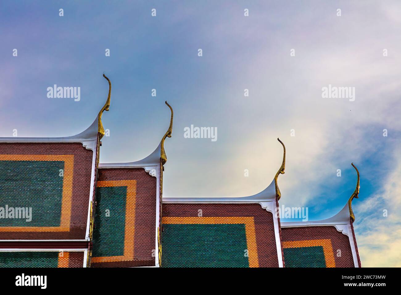 Colored temple Rooftop, Wat Suthat, Bangkok, Thailand. Blue, orange and ...