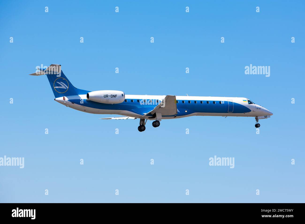 Boryspil, Ukraine - August 27, 2019: Airplane Embraer ERJ-145 (UR-DNF) of Windrose Airlines is landing in Boryspil International Airport Stock Photo